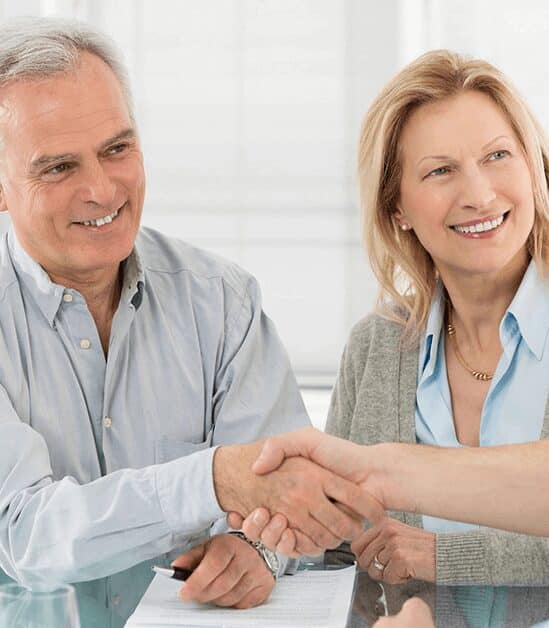 Positive Aged Couple Consulting With Insurance